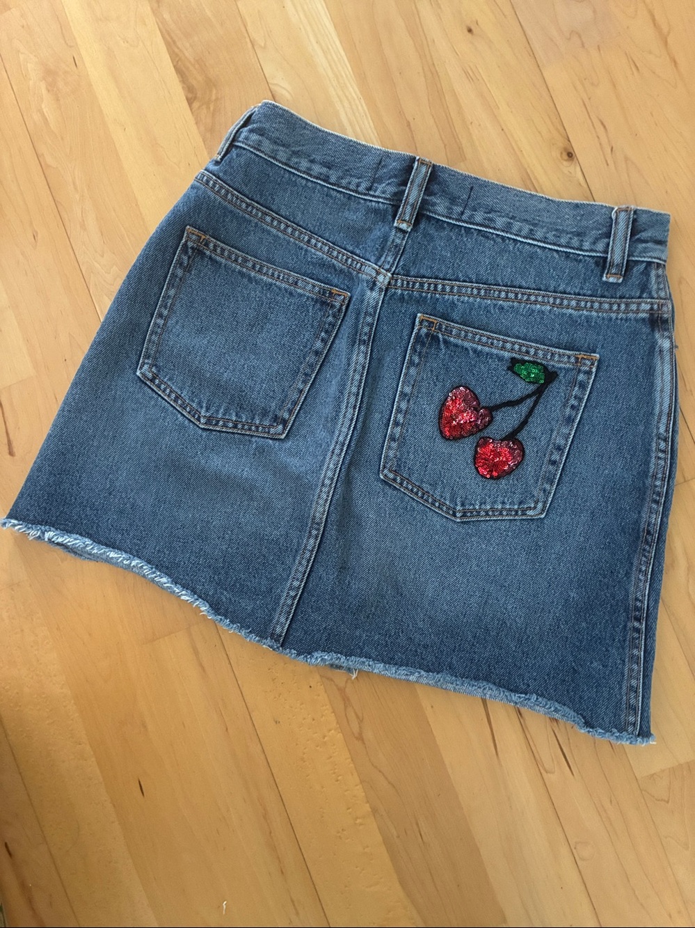 Marc Jacobs Jean Skirt size 27 Mini Denim Raw Hem Sequin Cherry Accent